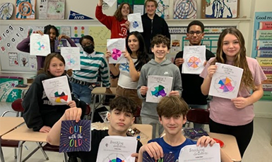  students show their Avid GPA worksheets